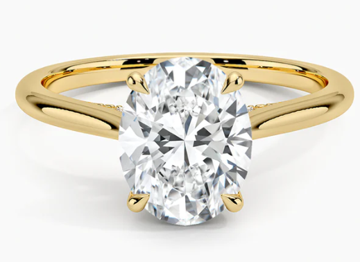 14 Karat Yellow Gold Oval Diamond Solitaire Ring Weighing .36 Carat Si1-J